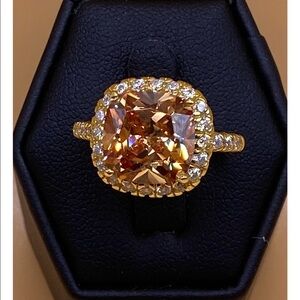 Gold Ring with Warm Honey-Orange Cushion Gemstone and Halo Accents